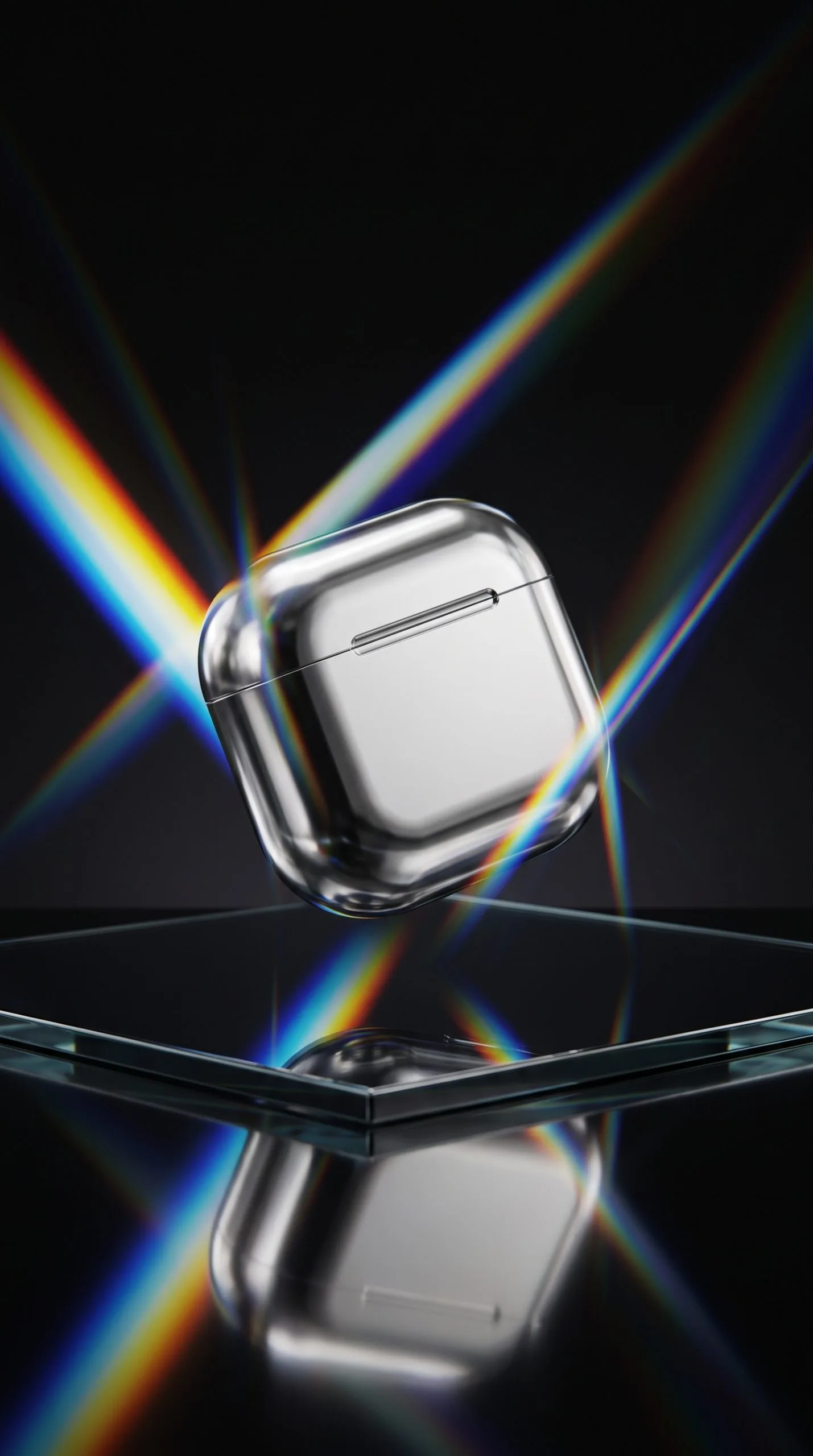 prism packshot effect featuring chrome headphones and a tech accessory on a reflective dark set